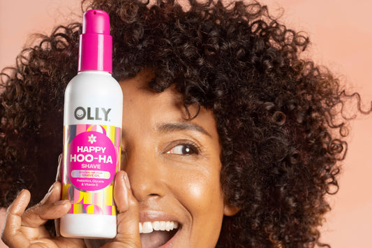 Woman holding OLLY Happy Hoo-Ha Shave