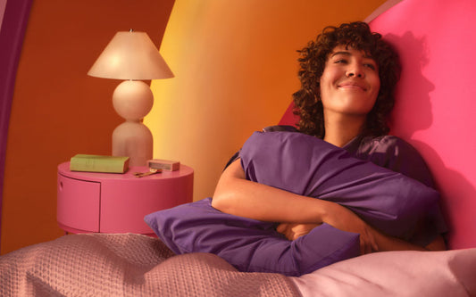 Smiling woman in bed