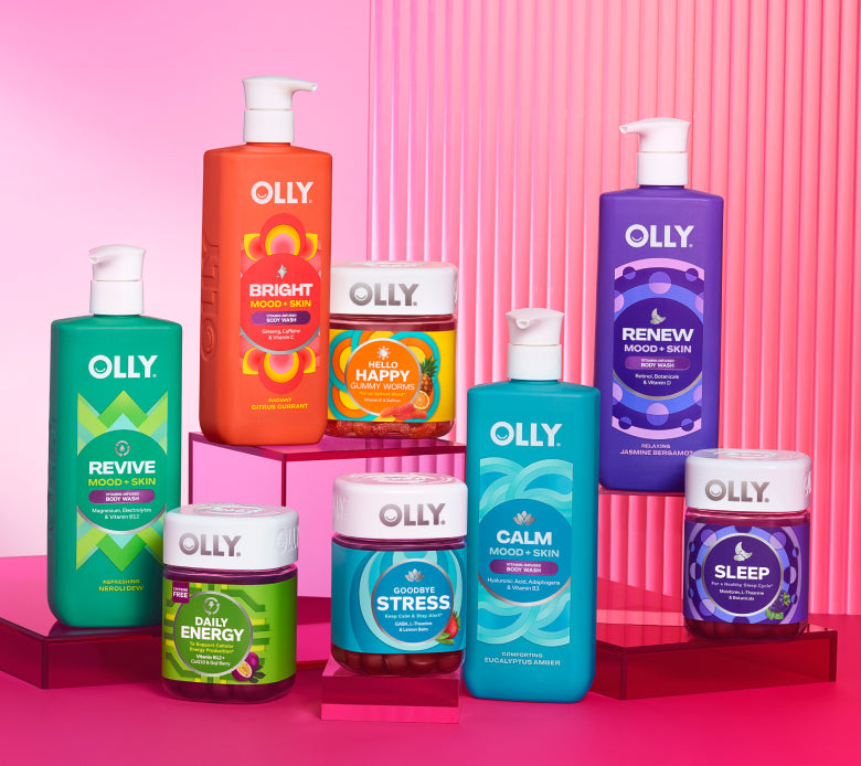 OLLY gummy vitamins and body products arranged on a colorful background