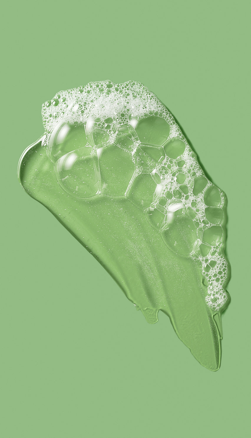 Body wash with bubbles on a green background icon