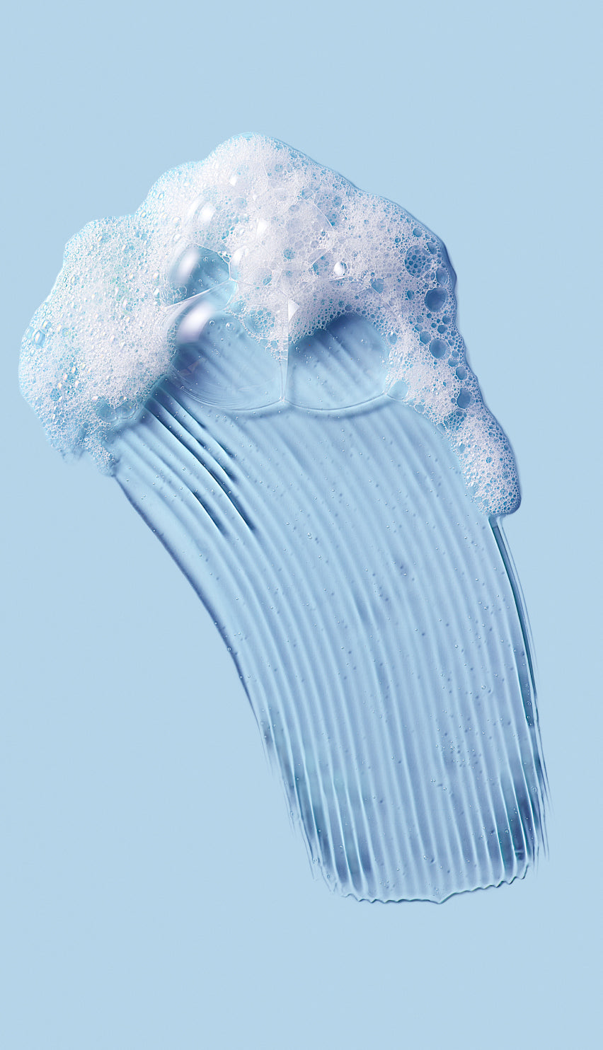 Foamy blue shampoo or soap bar with a comb on a light blue background icon