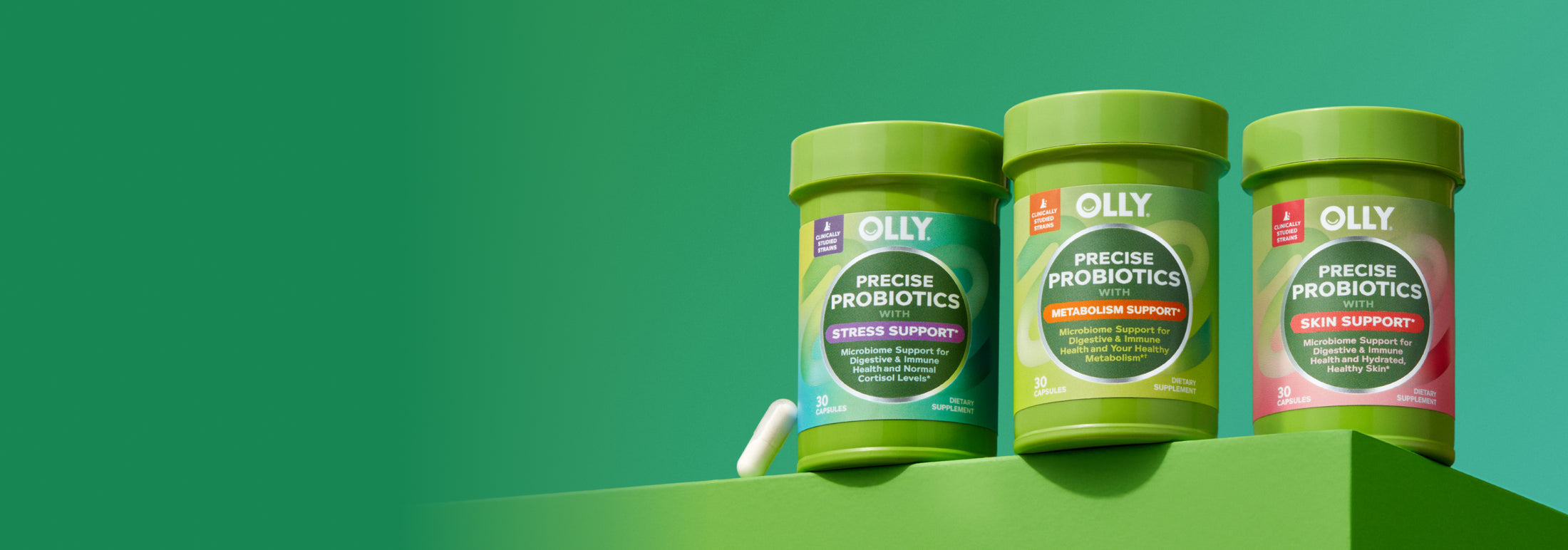 OLLY Precise Probiotics Products on a green background