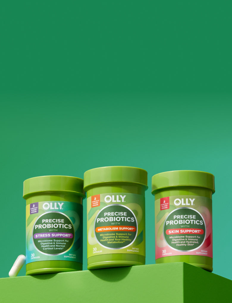 OLLY Precise Probiotics Products on a green background